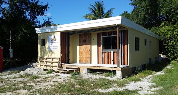 Shipping container house construction front